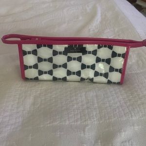 Kate Spade cosmetic bag. Never used! Perfect Kate Spade style!